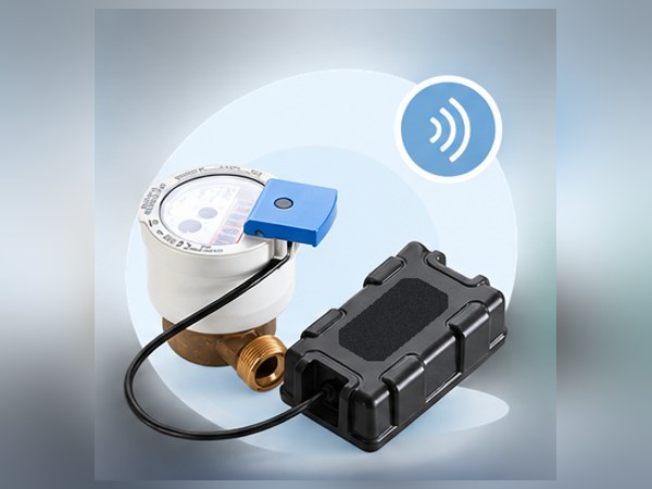 A pulse reader device wired to a residential water meter, with a clip-on sensor on the meter dial. Supplier product photograph, shown unbranded.